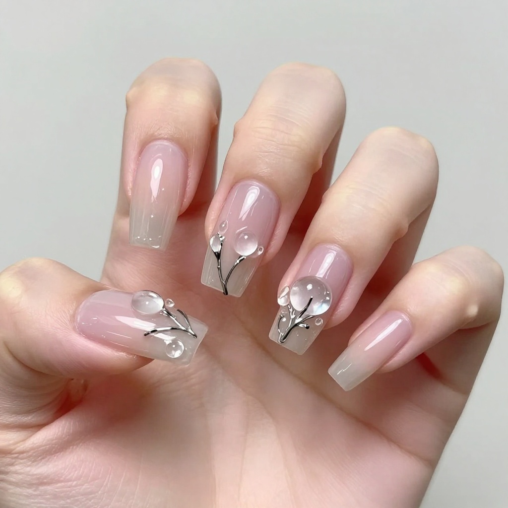 3D sculpted clear dew drops and chrome floral nail art